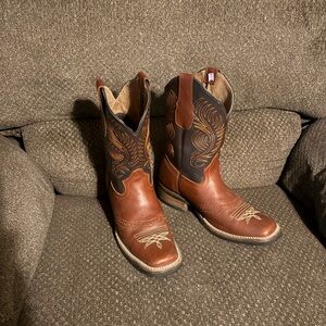 Men's Tan and Brown Western Boots with Intricate Stitching
